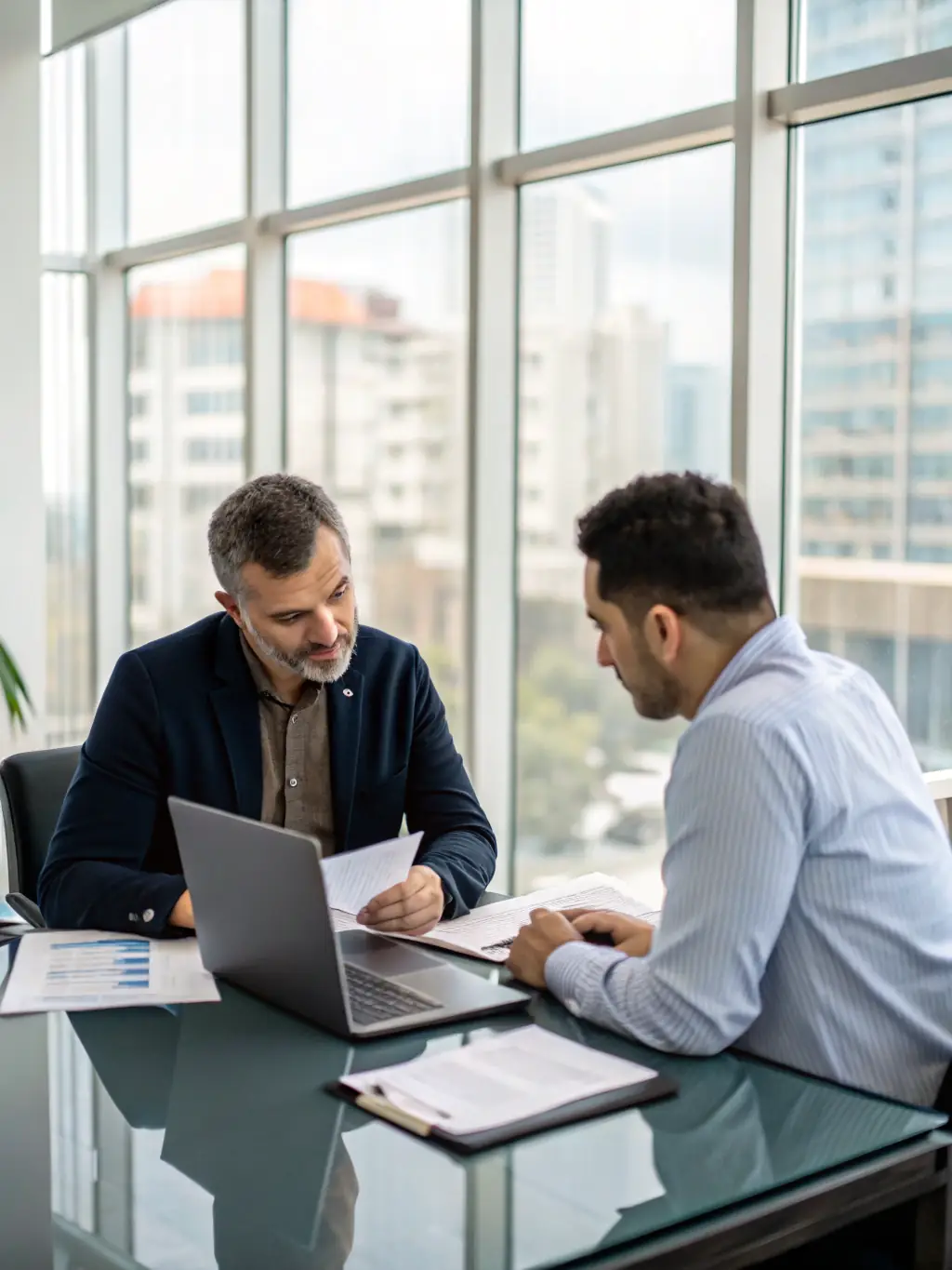 A business owner looking relieved while a Momentum TechFix technician handles a vendor issue on their behalf, illustrating the benefits of vendor management.